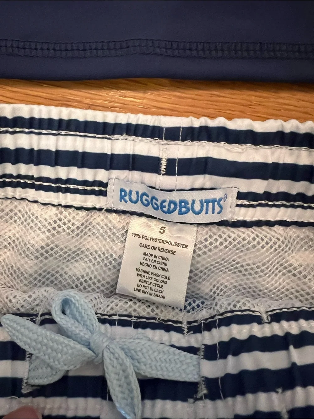 Ruffle Butts Navy Blue Long Sleeve Rash Guard